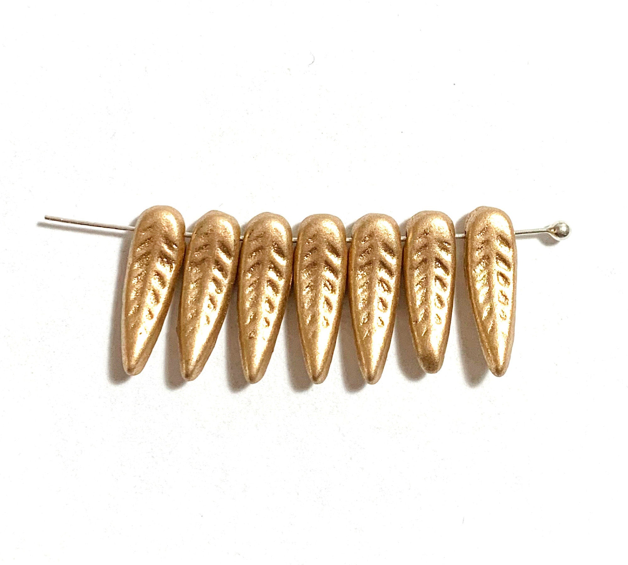 25 Czech glass curved feather or dagger beads - 17 x 5mm matte metallic gold textured pressed glass beads - C0096