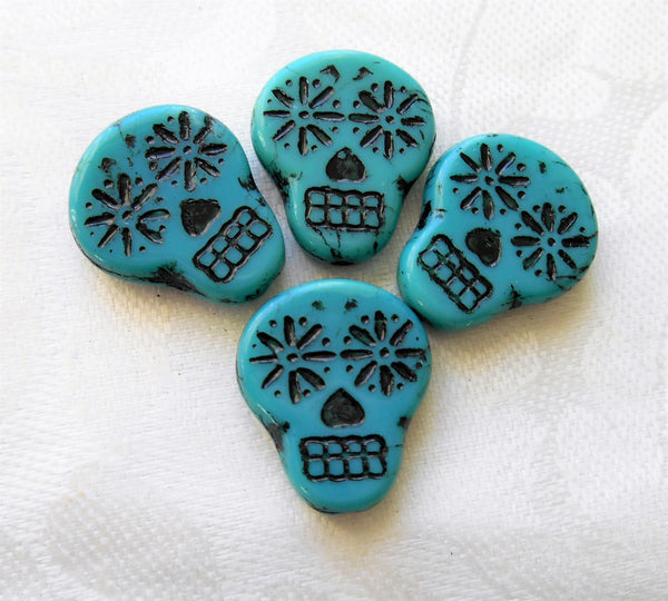 Four large turquoise blue & black Czech glass skull beads, opaque turquoise blue glass with a black wash, focal beads, 20mm x 17mm C02101
