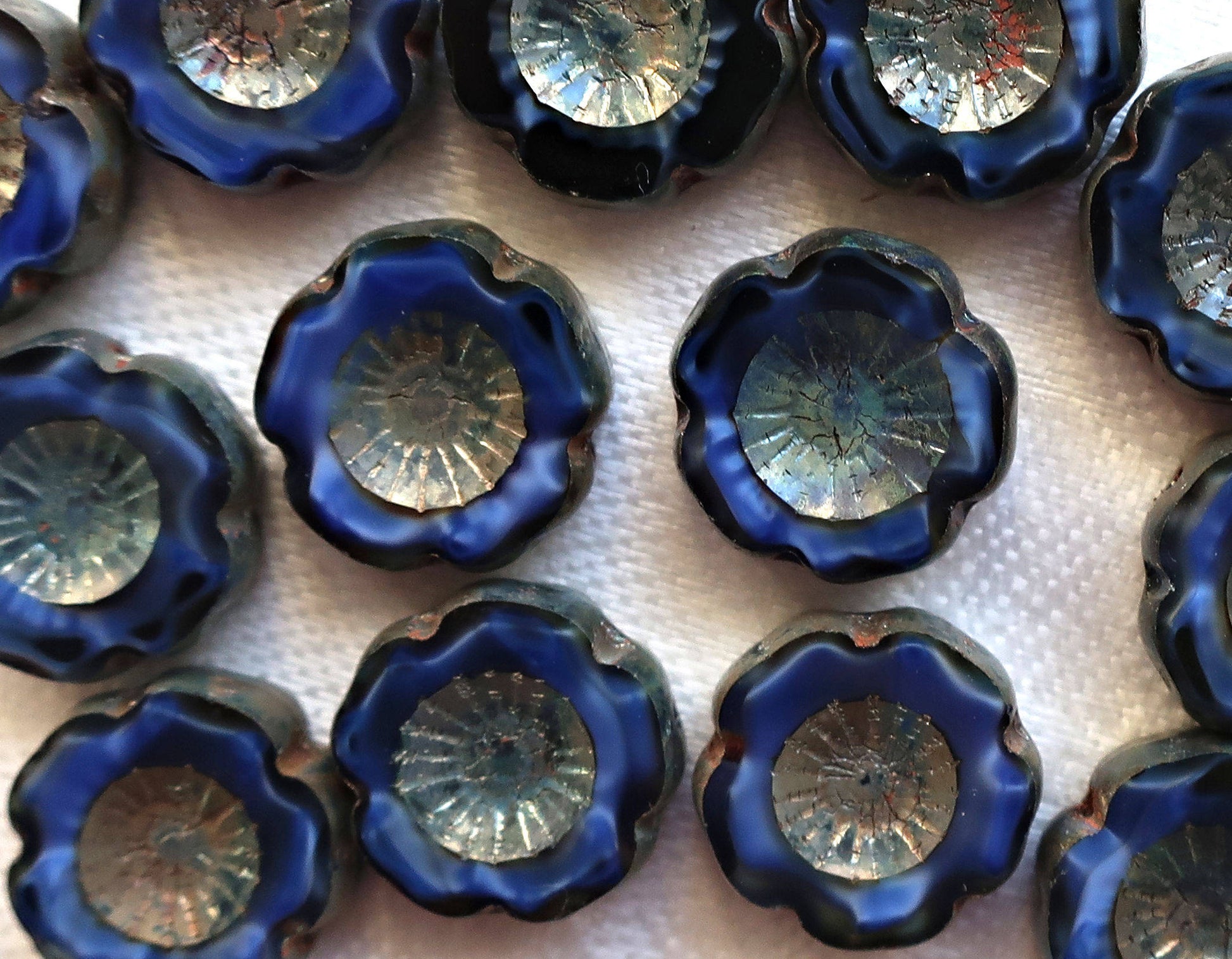 Lot of six 14mm table cut, carved, Czech glass flower beads. opaque, marbled satin, silk, midnight blue picasso Hawaiian flowers C80101 - Glorious Glass Beads