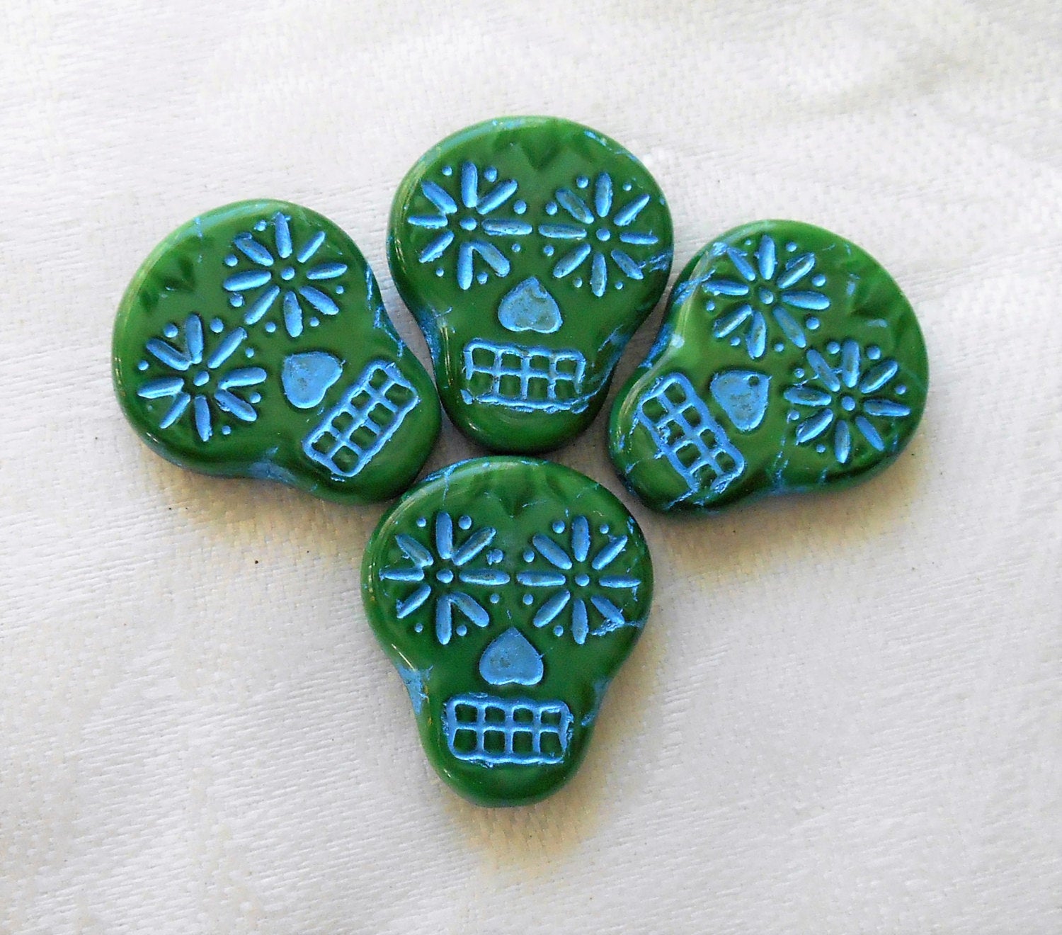 Four large green & blue Czech glass skull beads, opaque green glass with turquoise blue wash, focal beads, 20mm x 17mm C02101