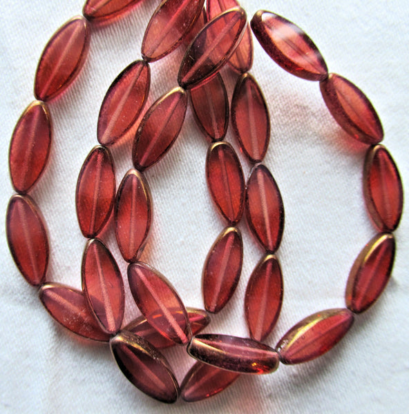 Ten Czech glass spindle beads - transparent dusty rose pink w/ bronze - 18 x 7mm table cut, almond shape tube beads C06301