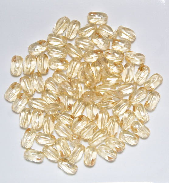 25 9mm x 6mm Crystal Champagne Czech glass twisted oval beads C0001