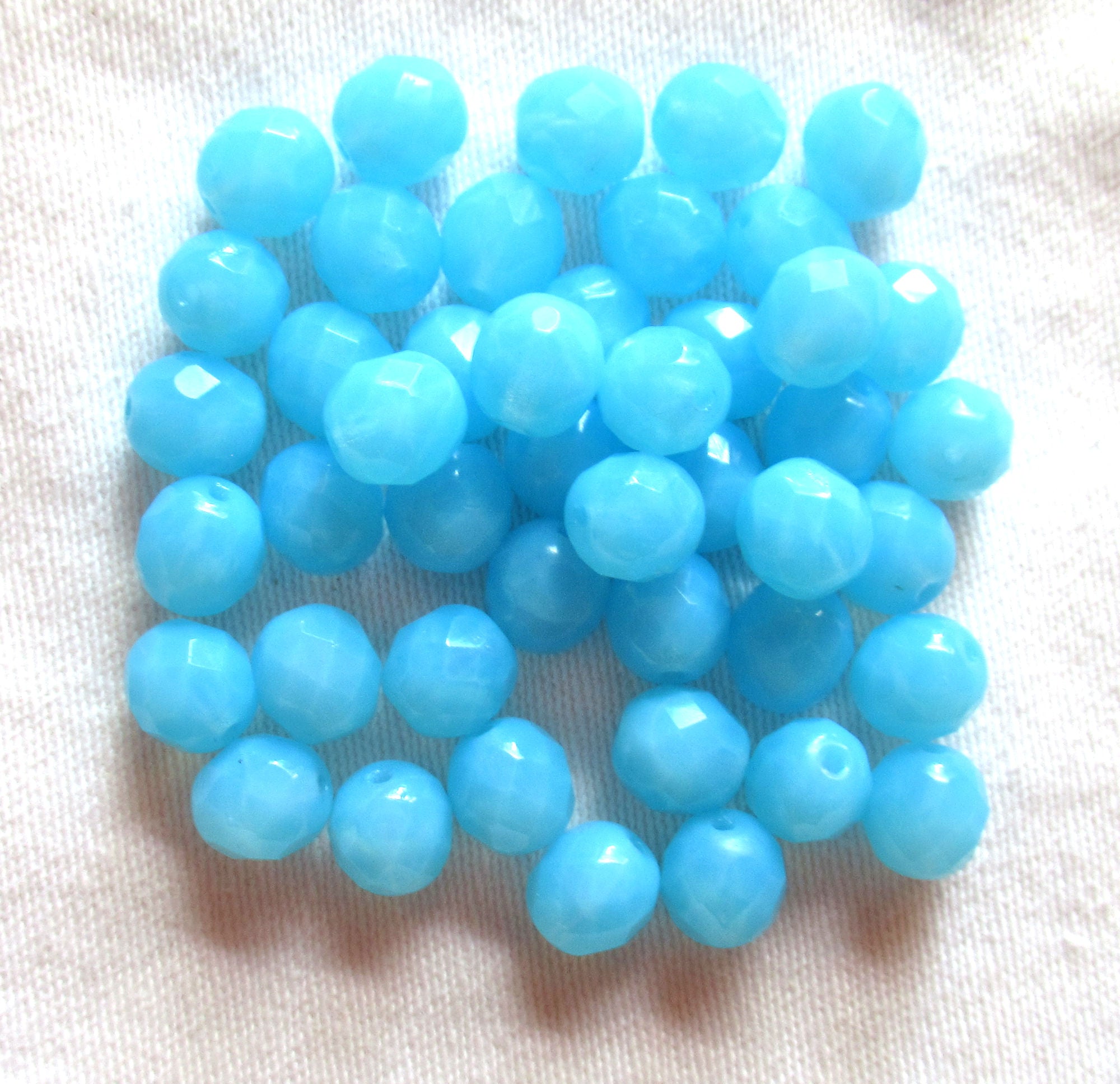 Lot of 25 8mm Powder Blue Opal opaque faceted round firepolished glass beads, C7825 - Glorious Glass Beads