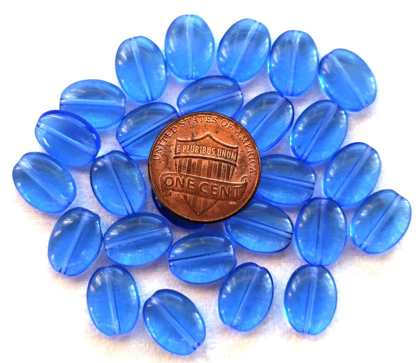 Lot of 25 transparent sapphire blue flat oval Czech Glass beads, 12mm x 9mm pressed glass beads C7425 - Glorious Glass Beads