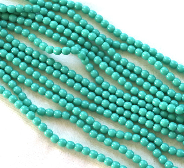 Lot of 100 3mm turquoise blue green Czech glass druks, smooth round druk beads C6601 - Glorious Glass Beads