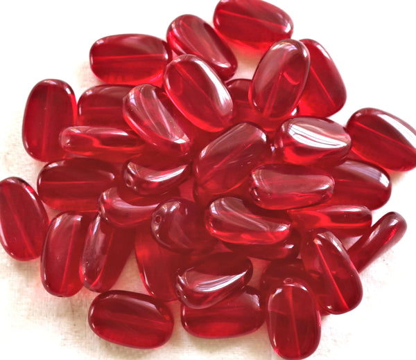 Lot of 15 transparent light garnet, ruby Red slightly twisted oval Czech Glass beads, 14mm x 8mm pressed glass beads C0047