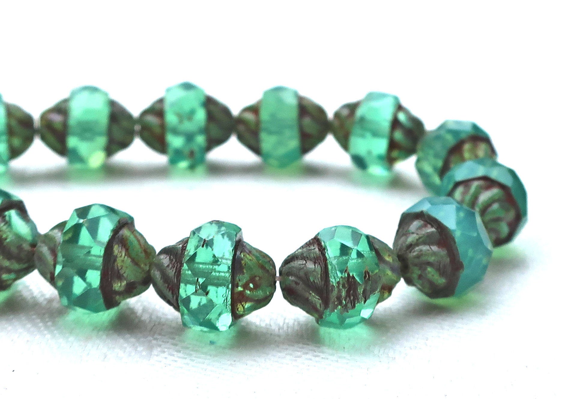 Five light teal Czech glass turbine beads. 11 x 10mm light slightly milky blue green faceted saucer beads with a Picasso finish C01101 - Glorious Glass Beads