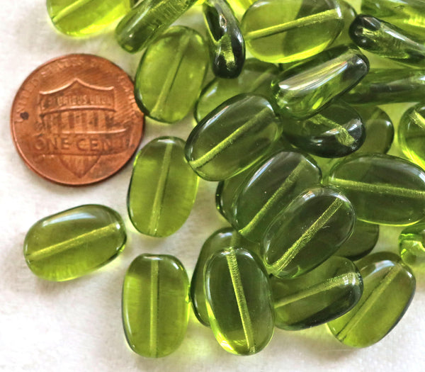 Lot of 25 transparent Olivine, Olive Green slightly twisted oval Czech Glass beads, 14mm x 8mm pressed glass beads C2925 - Glorious Glass Beads