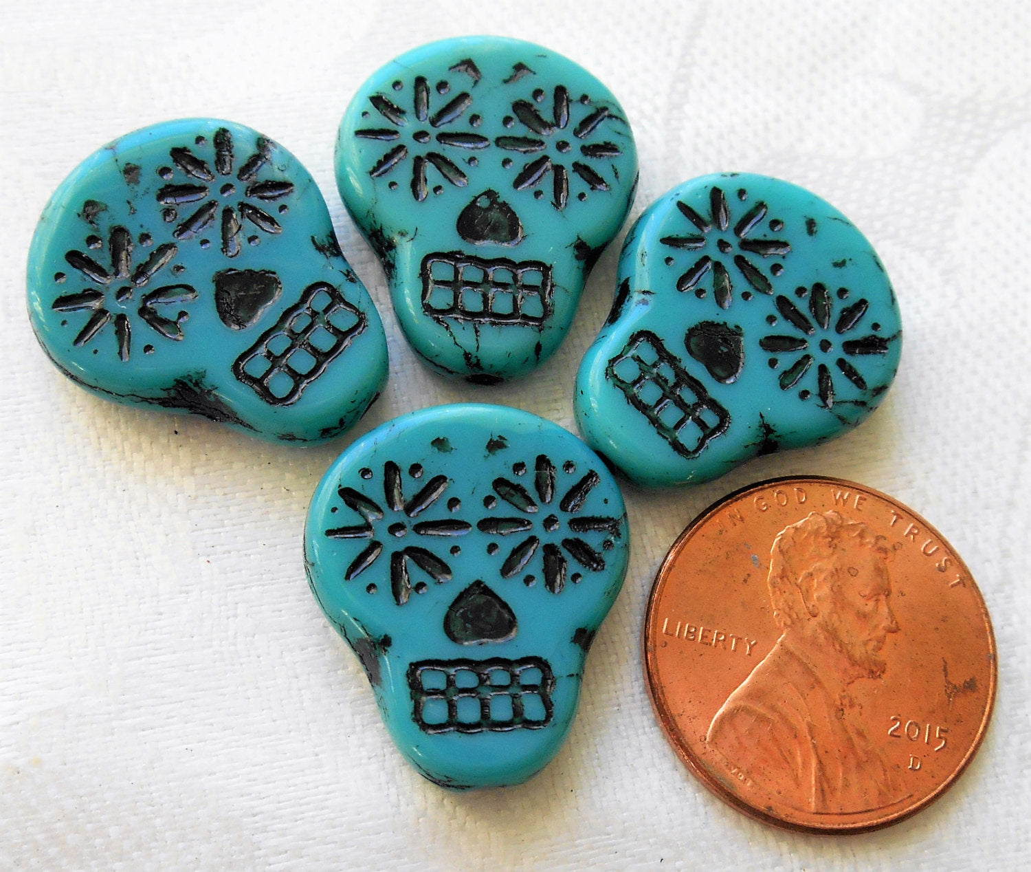 Four large turquoise blue & black Czech glass skull beads, opaque turquoise blue glass with a black wash, focal beads, 20mm x 17mm C02101