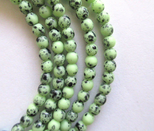 Lot of 50 4mm Czech glass druk beads - opaque speckled green smooth round druks - C0008