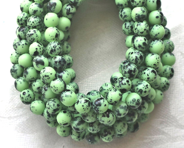 30 6mm Czech glass mint green spotted druk beads, spattered, speckled bird's egg, matte mint green smooth round druks C51130 - Glorious Glass Beads