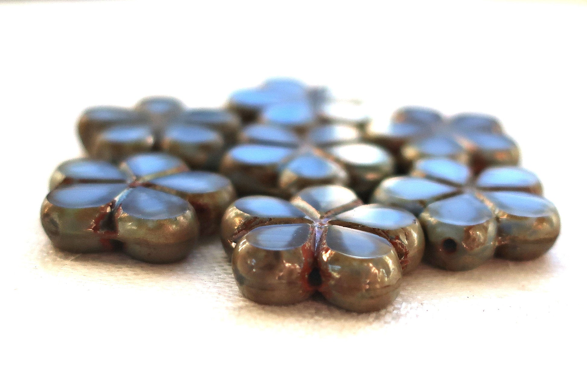 Lot of five 17mm table cut, carved,opaque, marbled denim blue with silver picasso accents, Czech glass flower beads C51105 - Glorious Glass Beads