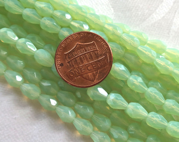 Lot of 25 7 x 5mm translucent light mint opal Green teardrop Czech glass beads, firepolished, faceted tear drops C5801 - Glorious Glass Beads