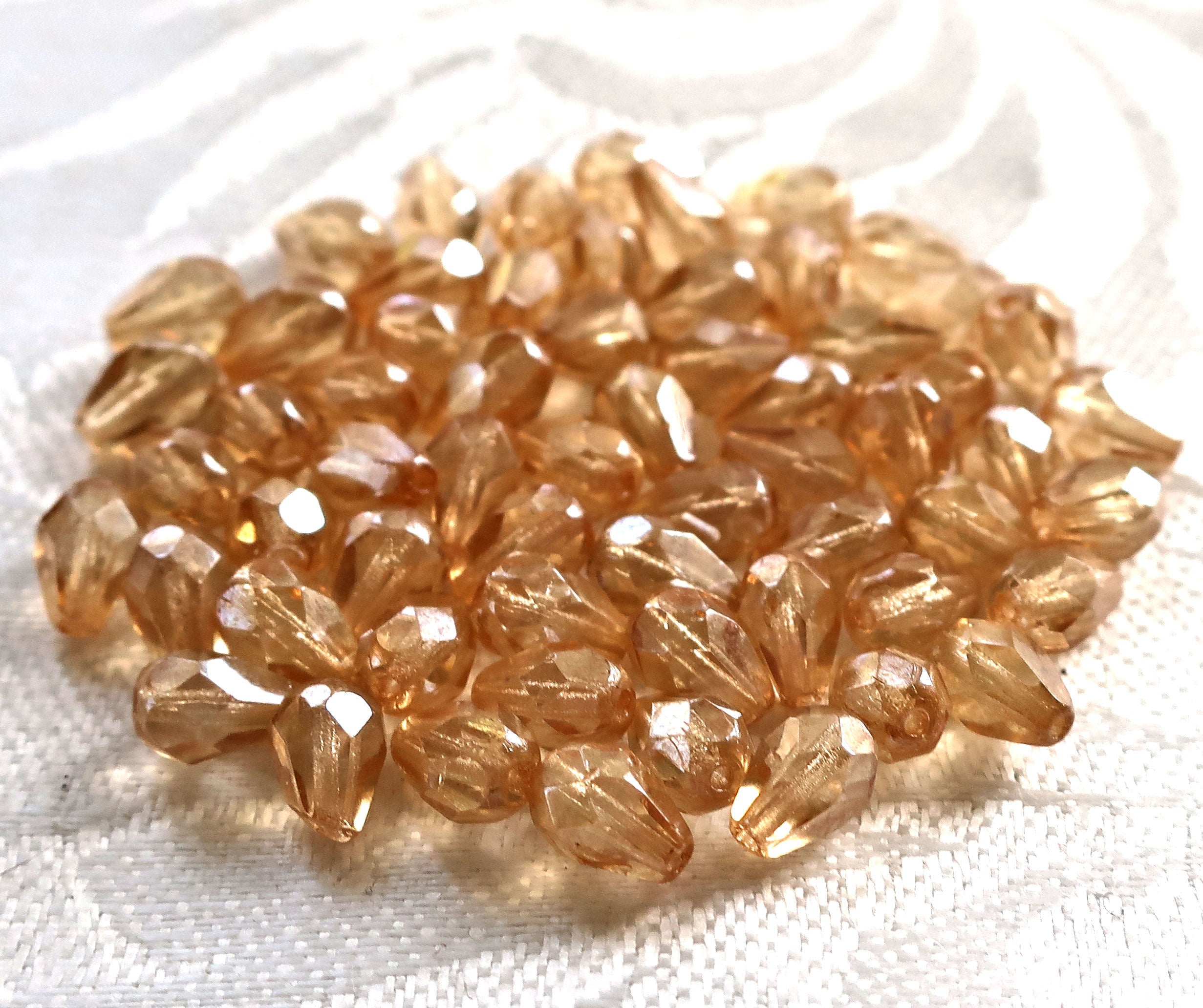 25 Crystal Champagne teardrop Czech glass beads - 7 x 5mm - faceted fire polished teardrops C7701