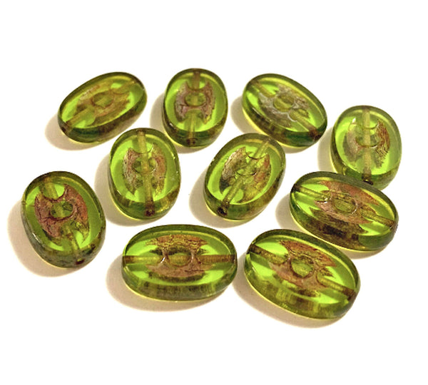 Ten 14 x 10mm rustic oval olivine or olive green picasso, table cut, Czech glass beads with dots front and back C0068