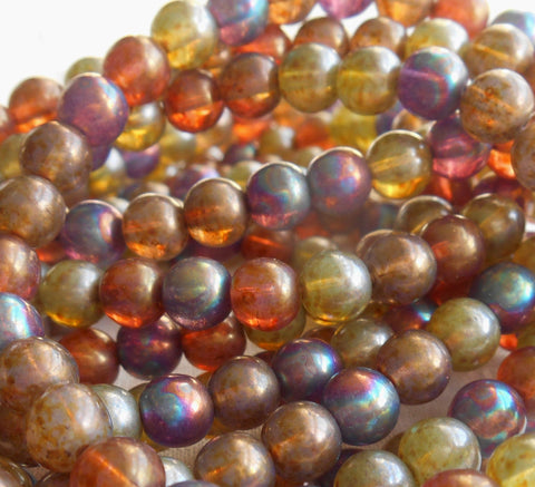 30 6mm Czech glass beads, earth tones mix, yellow, umber, purple, green etc. smooth round druk beads with an iridescent luster finish C2901