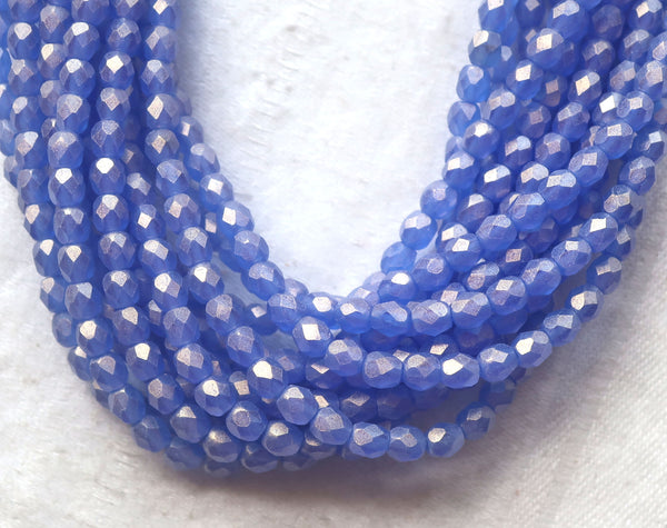 Lot of 50 4mm Czech glass beads, Sueded Gold Sapphire Blue firepolished, faceted beads. with a golden finish C9601