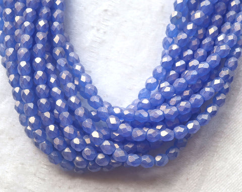 Lot of 50 4mm Czech glass beads, Sueded Gold Sapphire Blue firepolished, faceted beads. with a golden finish C9601 - Glorious Glass Beads