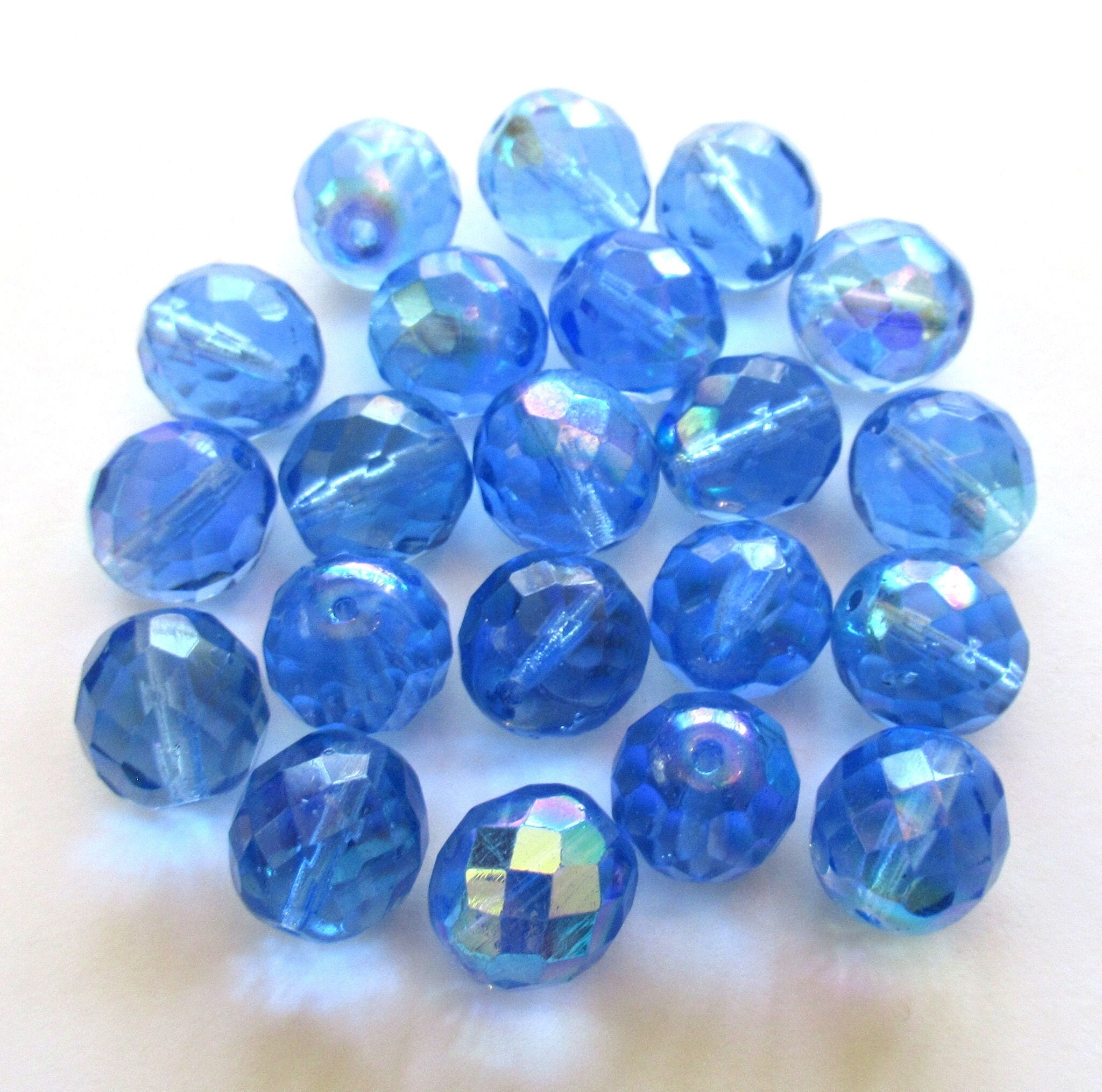 Ten Czech glass fire polished faceted round beads - 12mm light sapphire blue beads with an AB finish C0089