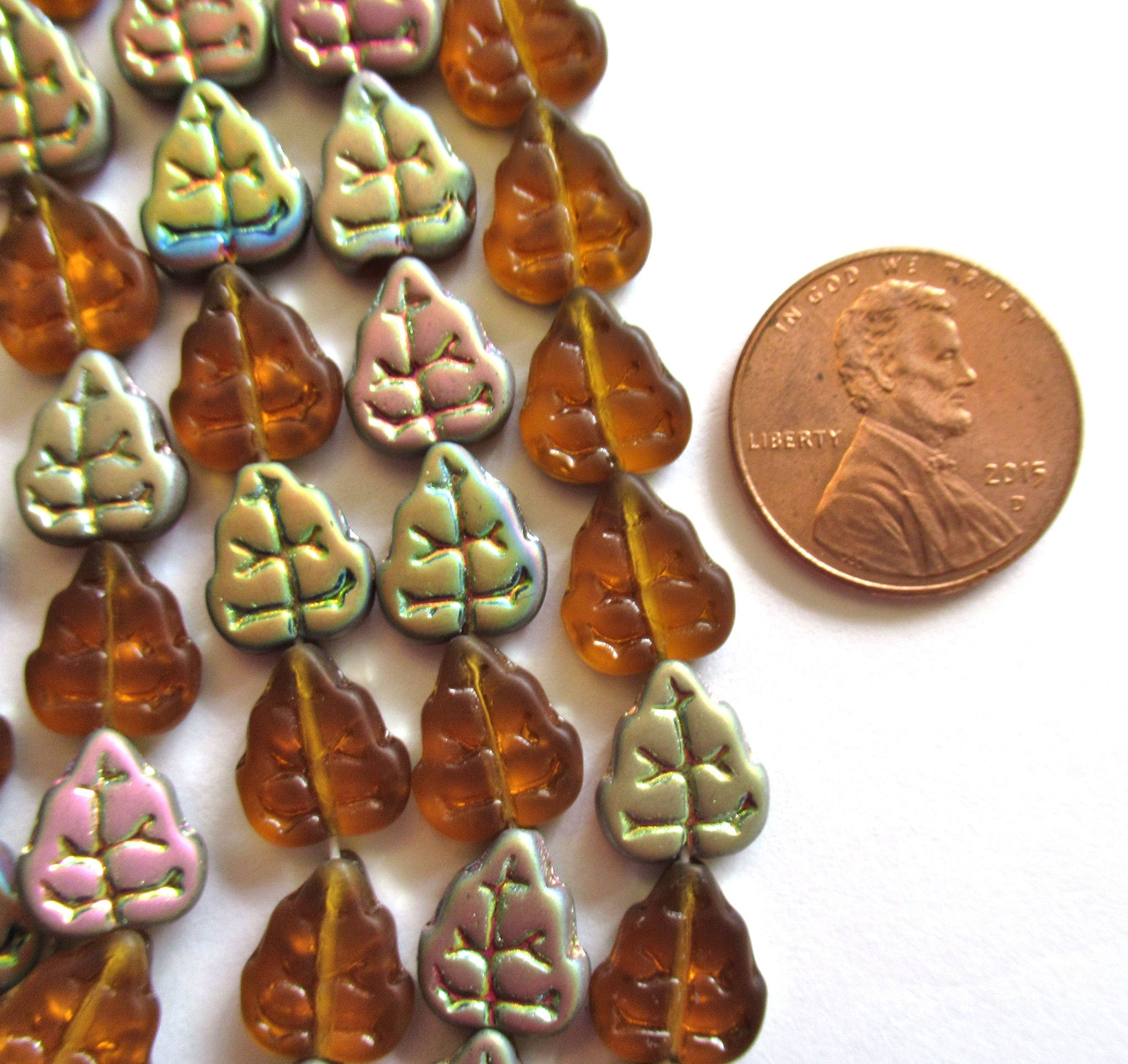 Lot of 25 Czech glass leaf beads - darktopaz AB - center drilled 8 x 10mm beads C0035