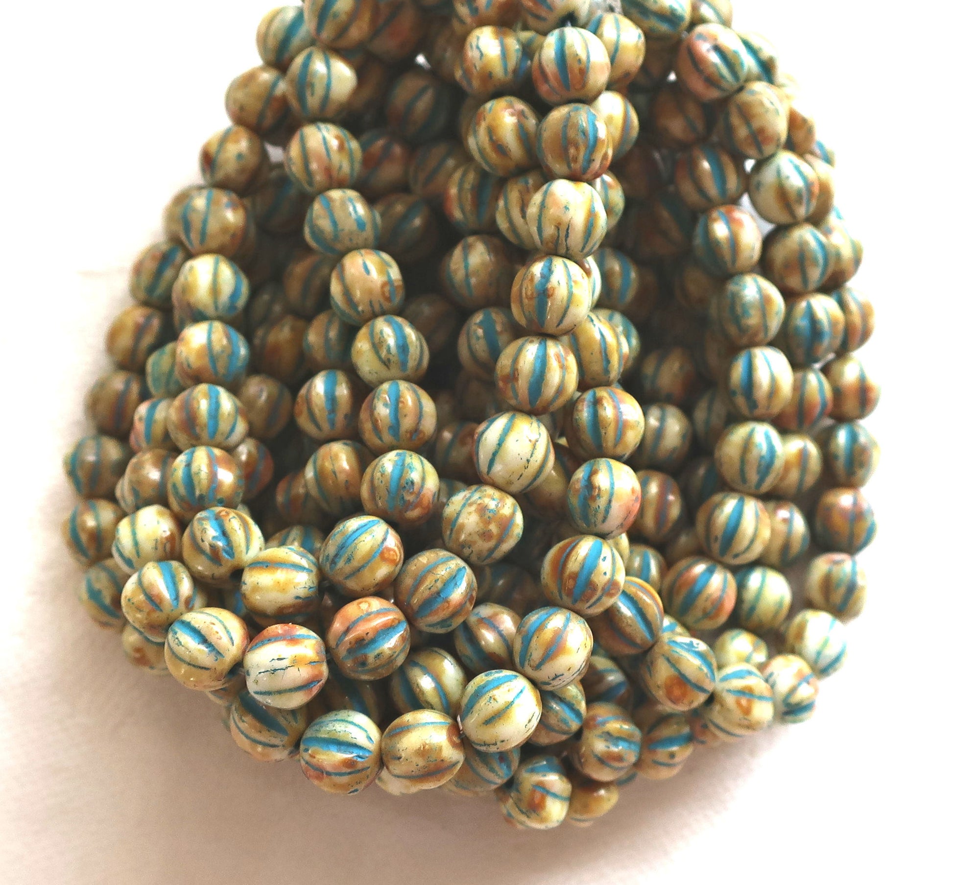 25 Striped ivory, off white & blue melon beads, 6mm pressed Czech glass beads with a turquoise wash C2701 - Glorious Glass Beads