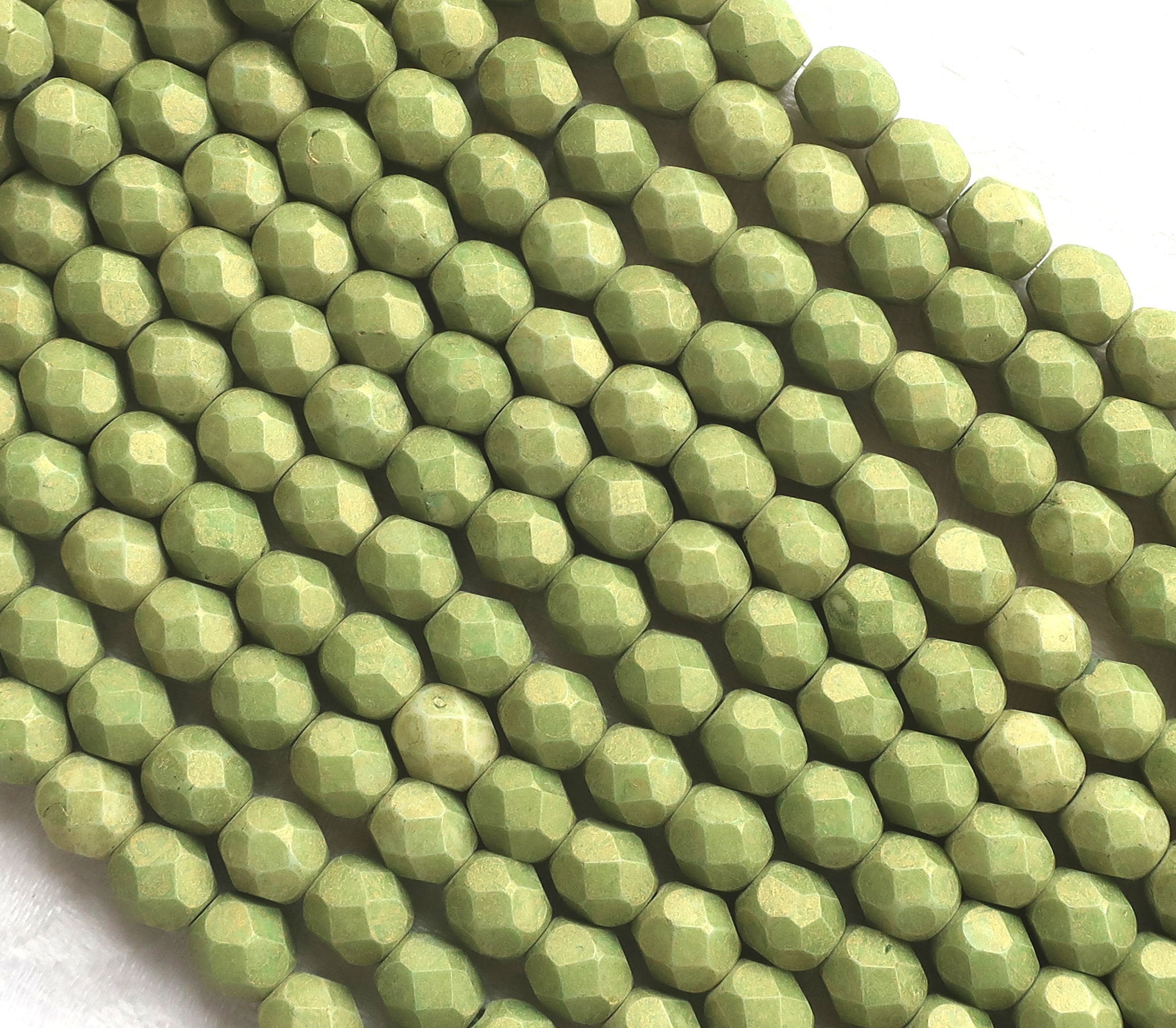 Lot of 25 6mm Opaque Pacifica Avocado green Czech glass beads, firepolished, faceted round beads, C8625 - Glorious Glass Beads