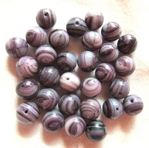 Lot of 25 8mm Czech glass druks - opaque amethyst or purple and white swirled glass - smooth round druk beads