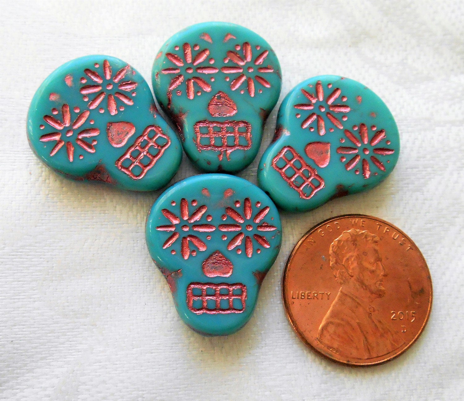 Four large turquoise blue & pink Czech glass skull beads, opaque turquoise blue glass with a pink wash, focal beads, 20mm x 17mm C02101