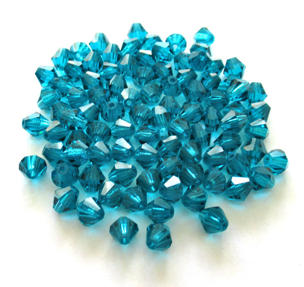 Lot of 24 6mm Czech Preciosa Crystal bicone beads - blue zircon faceted glass blue AB bicones 00201