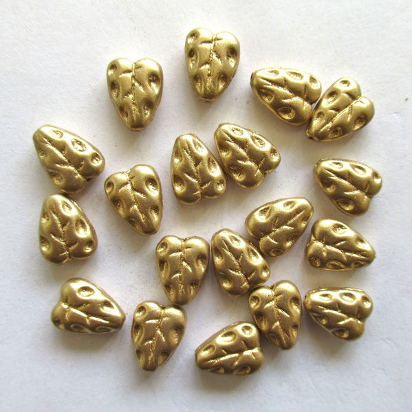 Twenty Czech glass leaf beads - 12 x 9mm matte metallic gold textured center drilled leaves - C00801