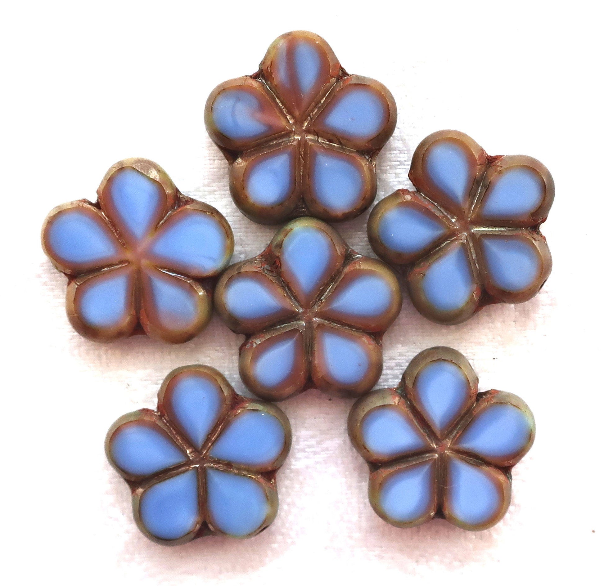 Lot of five 17mm table cut, carved,opaque, denim blue with pink / brown picasso accents, Czech glass flower beads C53105 - Glorious Glass Beads