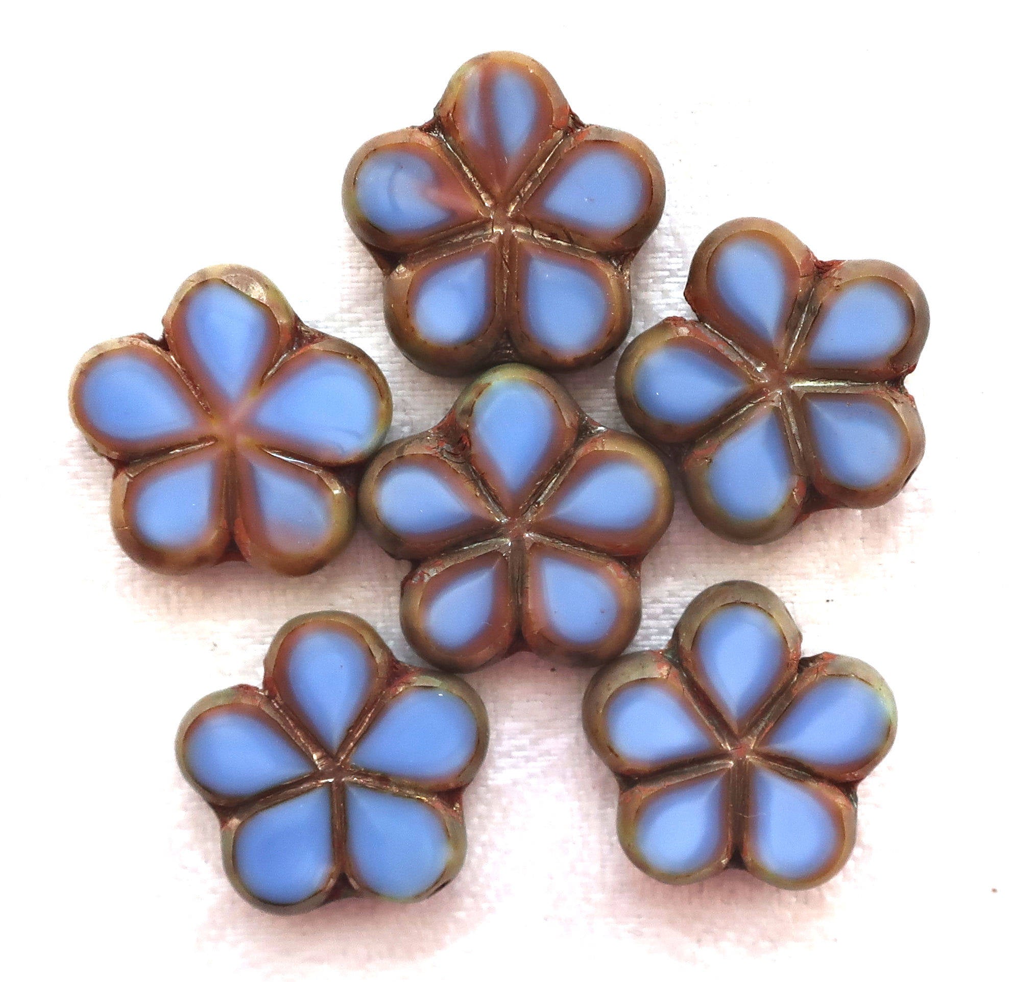 Lot of five 17mm table cut, carved,opaque, denim blue with pink / brown picasso accents, Czech glass flower beads C53105 - Glorious Glass Beads