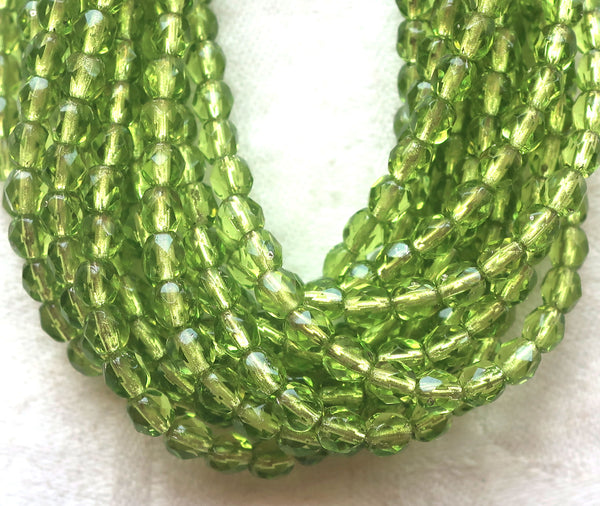 Lot of 50 4mm Czech glass beads, olive. olivine green, silver lined, firepolished faceted round beads C5550