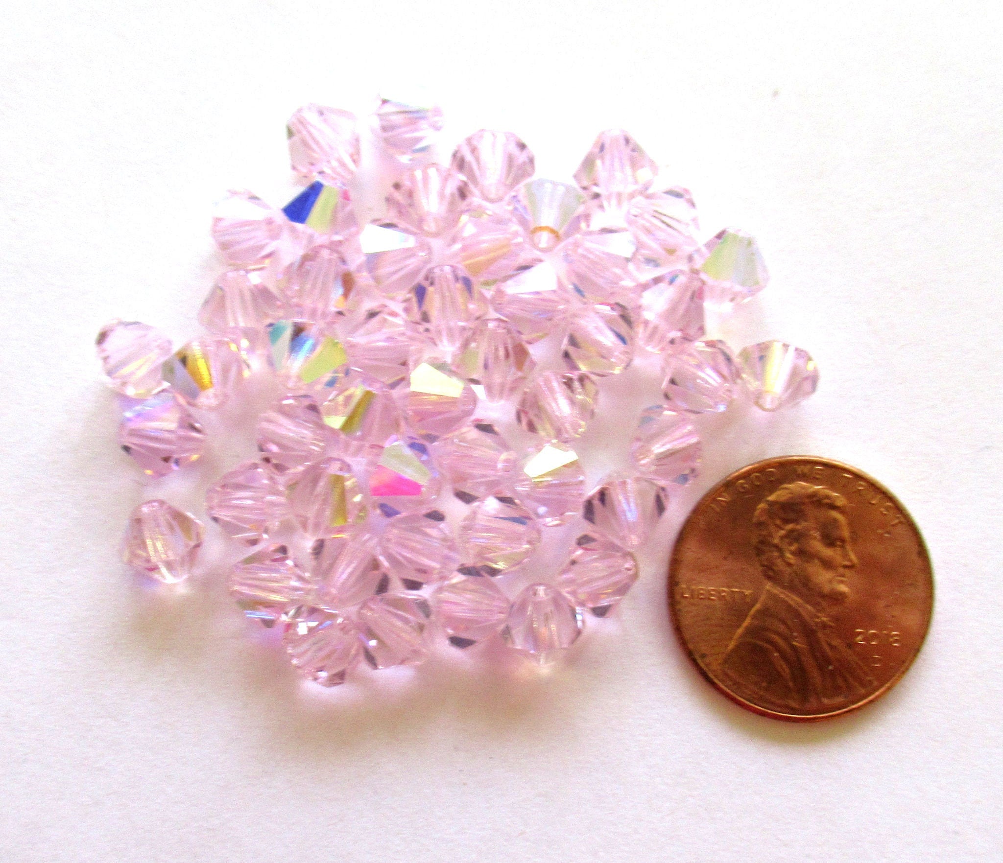 Lot of 24 6mm Czech Preciosa Crystal bicone beads - sapphire pink faceted glass bicones C00221