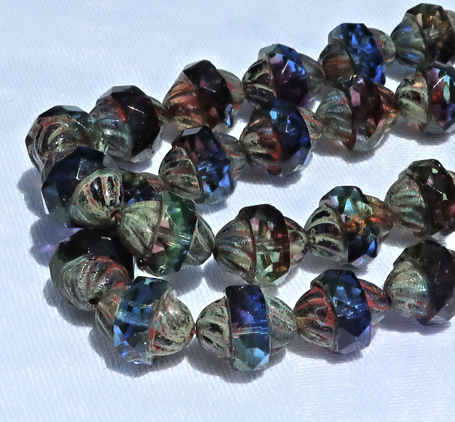 Ten Czech glass turbine beads - 11 x 10mm blue, purple / amethyst & green mix with a picasso finish C08101 - Glorious Glass Beads