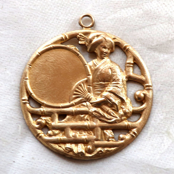 1 Asian brass medallion, pendant, woman, geisha with fan charm, ornament, brass stamping, japonaiserie, 46mm x 40mm, made in the USA C12101 - Glorious Glass Beads