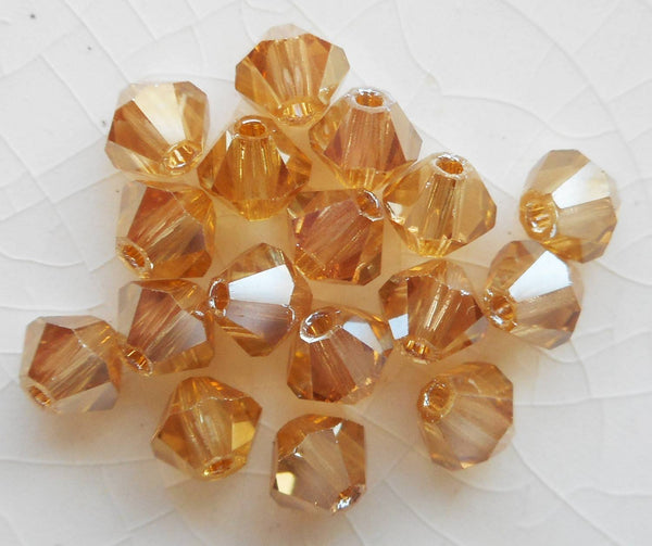 Lot of 24 4mm Golden Flare Gold Metallic Czech Preciosa Crystal bicone beads, faceted gold glass bicones C3501 - Glorious Glass Beads