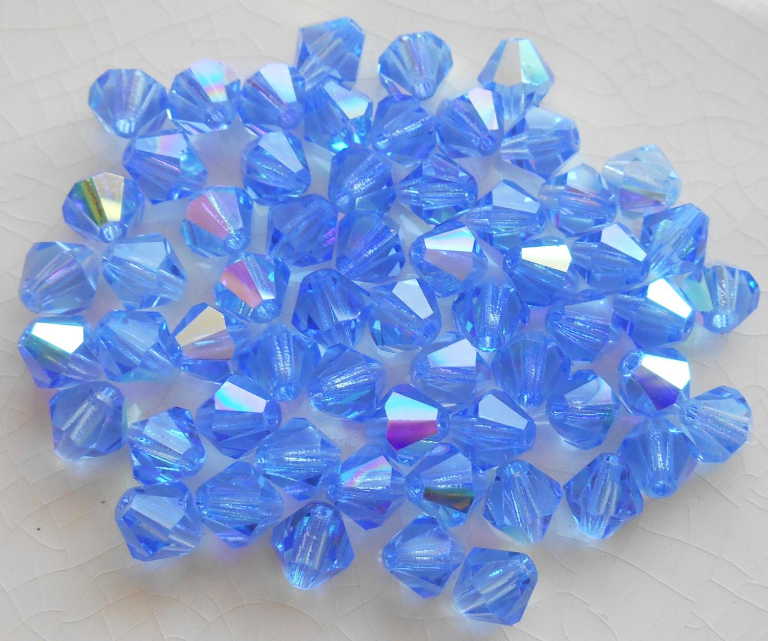 Lot of 24 6mm Sapphire Blue AB Czech Preciosa Crystal bicone beads, faceted glass blue AB bicones C60101 - Glorious Glass Beads