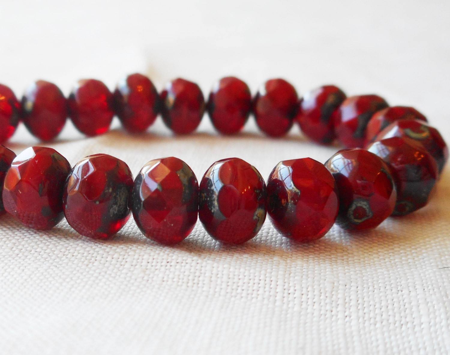 Lot of 25 Translucent Ruby Red Picasso faceted puffy rondelle or donut beads, 5 x 7mm, Czech glass beads C00201 - Glorious Glass Beads