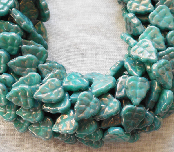 Lot of 25 Czech glass leaf beads, Luster Opaque Turquoise Blue center drilled 8 x 10mm beads C0045