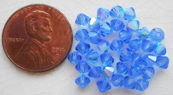 Lot of 24 4mm Sapphire Blue AB Czech Preciosa Crystal bicone beads, faceted glass blue AB bicones C5601 - Glorious Glass Beads