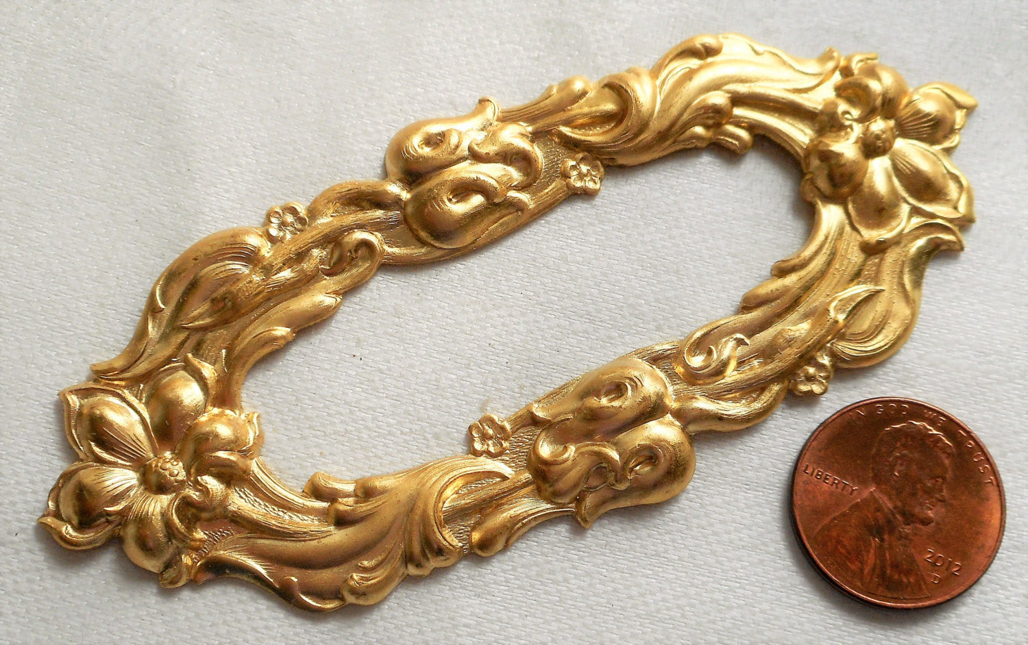 One raw brass stamping, large oval frame in flowers and fronds, pendant, connector, ring, ornament, 3.6" x 1.5", made in the USA C45101 - Glorious Glass Beads