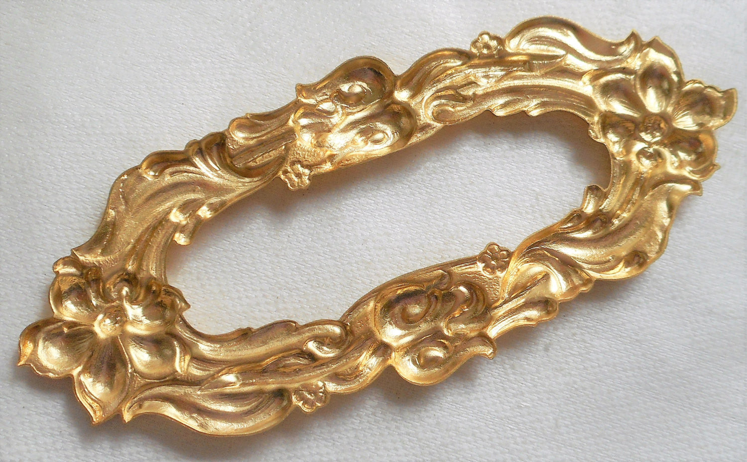 One raw brass stamping, large oval frame in flowers and fronds, pendant, connector, ring, ornament, 3.6" x 1.5", made in the USA C45101 - Glorious Glass Beads
