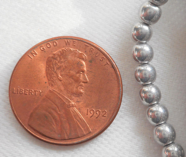 Lot of 100 4mm metallic silver Czech glass druk beads, silver smooth round druks, C2901 - Glorious Glass Beads