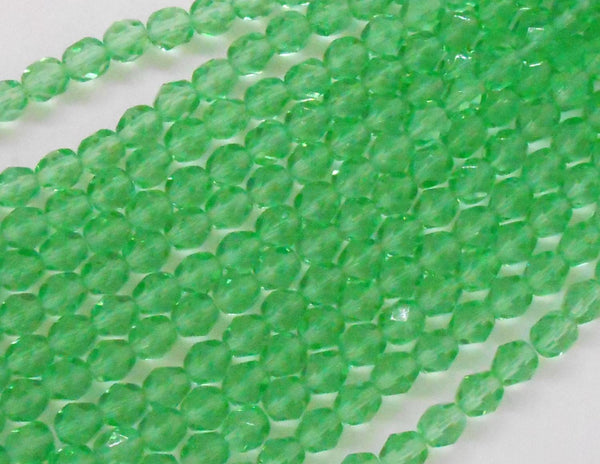 Lot of 25 6mm Czech glass, peridot green firepolished faceted round beads, C7925 - Glorious Glass Beads