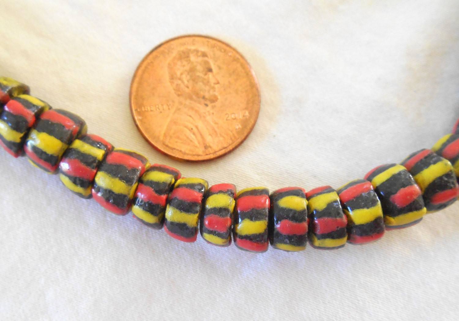 Lot of 124 African Trade Beads made in Ghana, brown beads with yellow and orange stripes, 000101 - Glorious Glass Beads