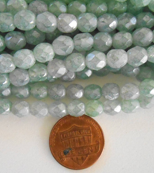 Lot of 25 6mm Luster Stone Green Czech glass, firepolished, faceted round beads with a luster finish, C9425 - Glorious Glass Beads