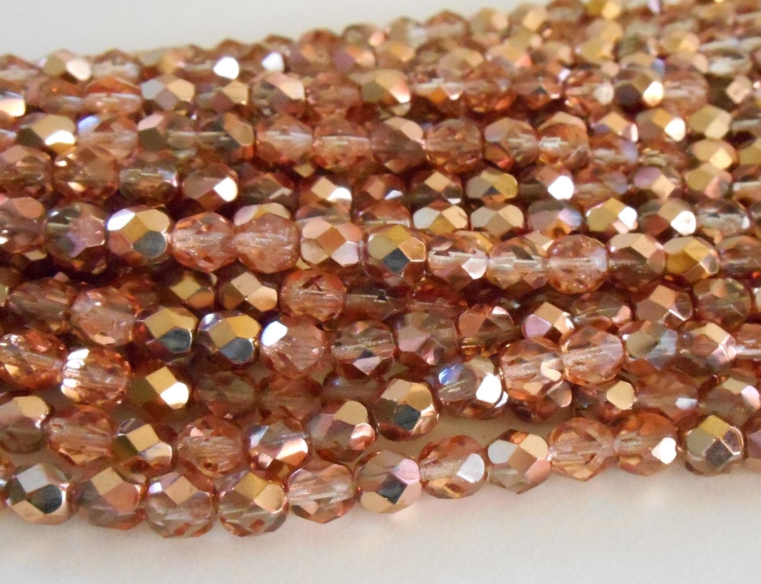 Lot of 25 6mm Apollo Gold Czech glass, crystal and gold firepolished, faceted round beads, C9425 - Glorious Glass Beads