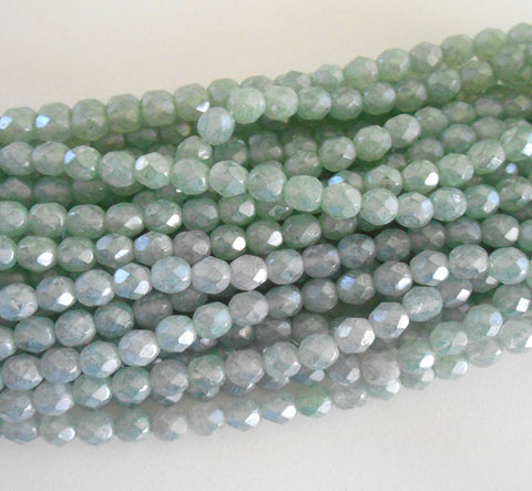Lot of 25 6mm Luster Stone Green Czech glass, firepolished, faceted round beads with a luster finish, C9425 - Glorious Glass Beads