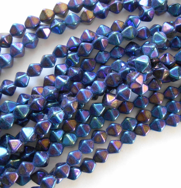 Fifty 6mm Blue Iris bicone beads - pressed glass Czech glass bicones, C0034